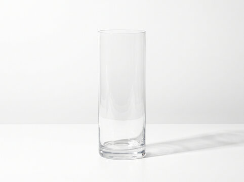 Clear glass cylindrical vase isolated