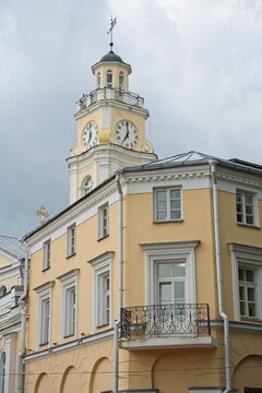 Vitebsk, Belarus, July 8, 2026. The town hall tower above an old house.                               