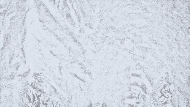 Light gray abstract texture featuring a distressed surface with soft crumpled paper folds and rough plaster details.