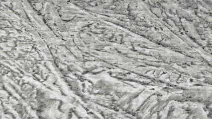 Naklejka premium A highly detailed textured concrete surface featuring a weathered gray finish with natural wavy patterns and distressed imperfections.