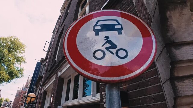 Dutch road sign indicating no entry for cars and motorcycles