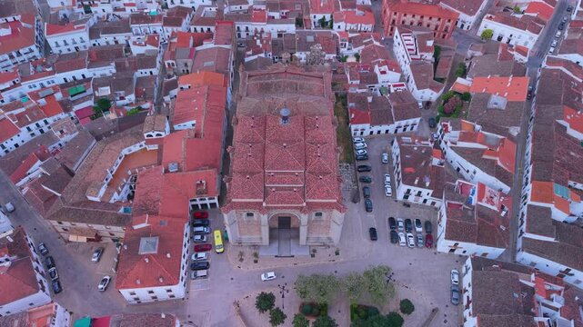Aerial drone view of the Parish Church of Our Lady of the Assumption and the town of Aracena in the Sierra de Aracena and Picos de Aroche Natural Park, Sierra Morena, Province of Huelva, Andalusia, Sp