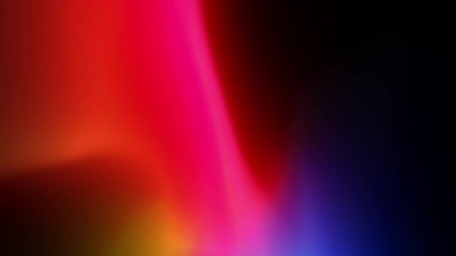 Abstract vibrant neon glow background with a smooth gradient of bright red, pink, and deep blue colors