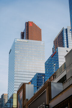 Toronto, Canada - June 20, 2026: Modern office towers with Deloitte and Scotiabank logos in downtown financial district