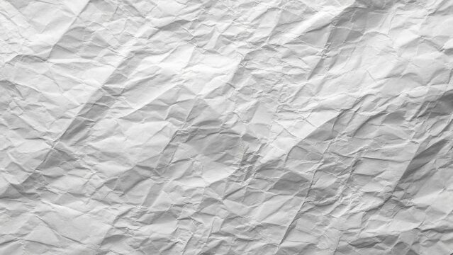 White wrinkled paper texture with realistic creases and folds, abstract recycled background with copy space for eco concepts, branding, packaging and creative design.