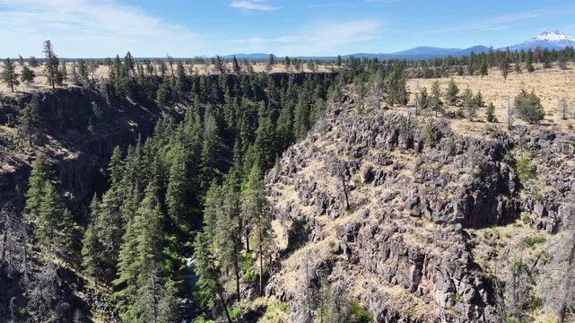 Over millennia Mill Creek has carved a 230-foot deep canyon on the Central Oregon plateau between Bend and Portland. This rugged yet scenic area of high desert is part of the Warm Springs reservation.