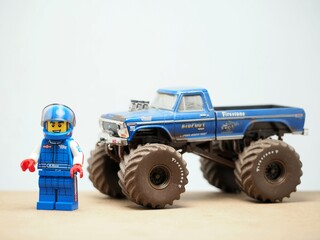 Fototapeta premium Indonesia - May 3, 2023 : Mini toy at table with blurred background. Monster Jam car concept design