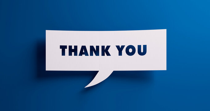 Speech bubble with the words thank you in front of a blue colored wall - 3D illustration