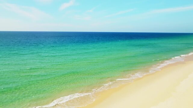 Beautiful sea summer landscape, Waves sea water surface High quality video Bird's eye view, Drone top view waves crashing on sand beach,Nature ocean sea beach background
