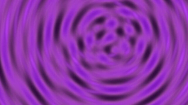 Vibrant purple spiral pattern radiates outward with hypnotic motion and dynamic energy.