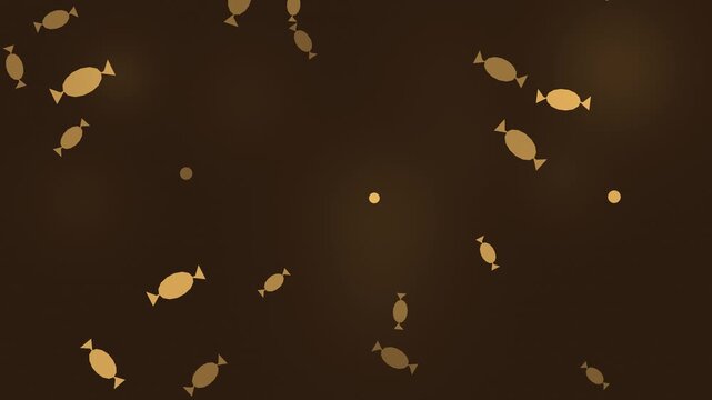 Halloween background of falling wrapped candies, seamless loop in golden amber
