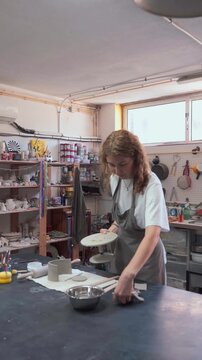 Woman Creating Ceramics in Art Studio