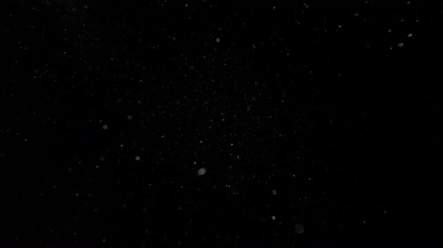 Super Slow Motion Dust Particles Floating in Air, Atmospheric Overlay at 1000fps.