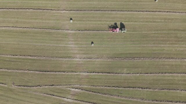 Rural farm tractor in open field landscape