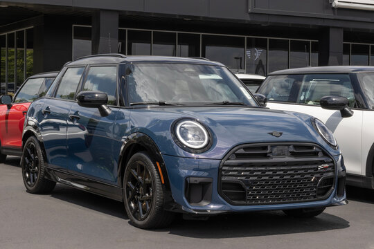 MINI Cooper S 4-Door at a dealership. MINI offers the Cooper S with a 201HP 2.0L TwinPower Turbo 4-Cylinder engine. MY:2026