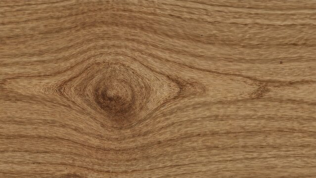 Close-up of a wooden surface with natural grain patterns and knots.