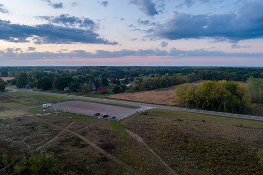 Rural landscape at twilight featuring fields and Crandell Lake parking lot
