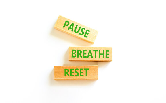 Pause breathe reset words symbol. Concept words Pause breathe reset on beautiful wooden blocks. Beautiful white background. Business support motivational and pause breathe reset concept. Copy space.