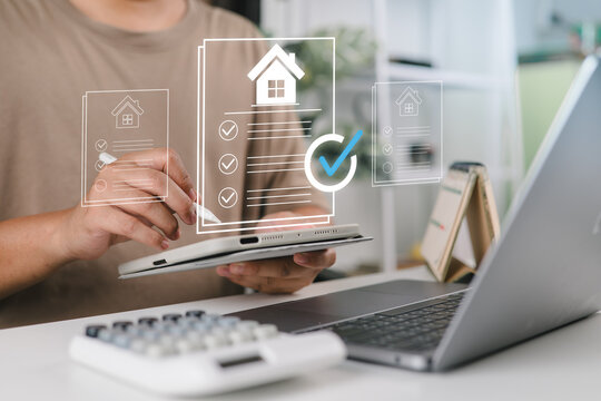 Businessman reviewing property documents and housing market information on smartphone, analyzing real estate prices, home financing options, investment value, and market trends