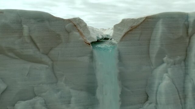 Glacier Ice Melt Dripping from a Massive Arctic Iceberg