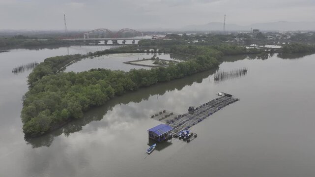 view of oyster farming rafts on the river in Long Son, near Ho Chi Minh City, Vietnam.