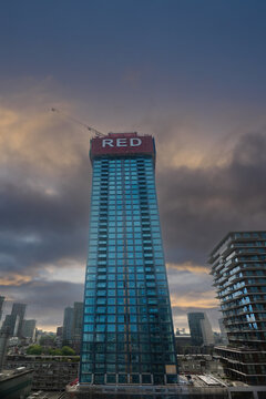 Rotterdam, The Netherlands. 08,07,2026. Modern High Rise Building at Sunset