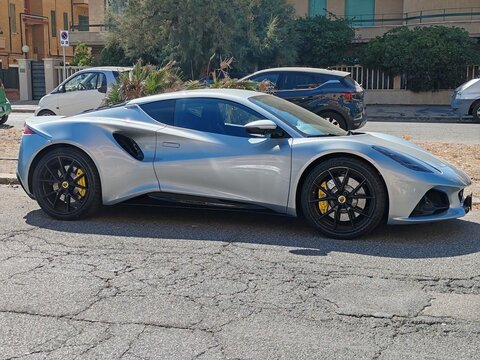 Ostia, Rome, Italy - July 25, 2026, a Lotus Emira, codenamed Tipo 131. The car was unveiled by British automaker Lotus Cars on July 7, 2021, parked in a square near the seafront.