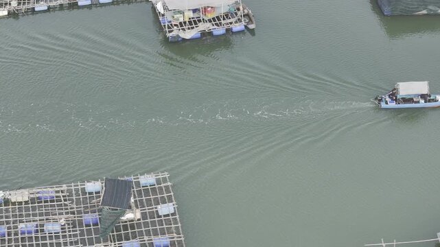 Aerial drone view of oyster farming rafts on the river in Long Son, near Ho Chi Minh City, Vietnam.