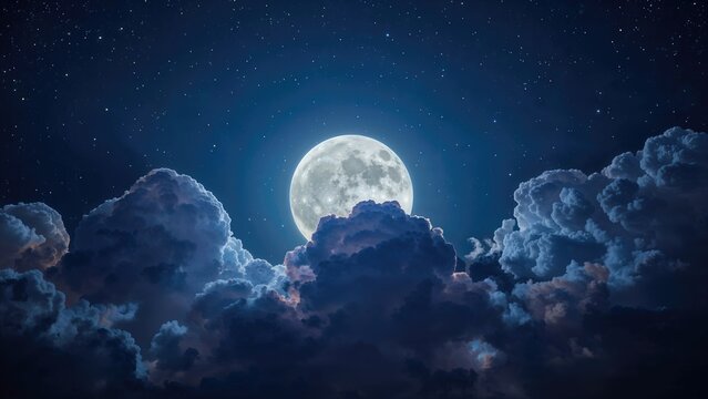 Bright full moon illuminating night sky with clouds and stars.