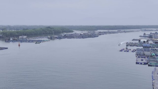Aerial drone view of oyster farming rafts on the river in Long Son, near Ho Chi Minh City, Vietnam.