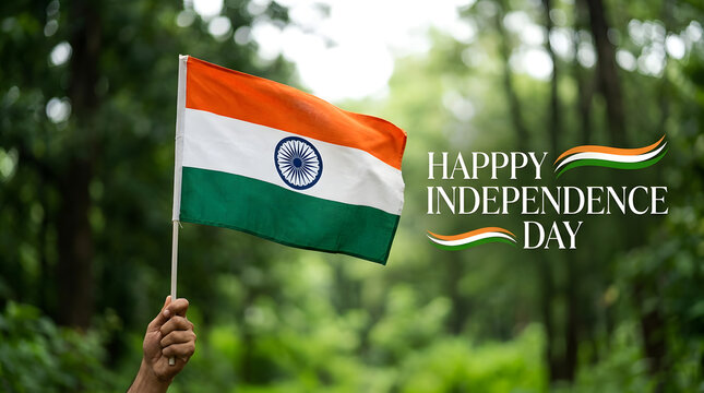 Hand holding Indian flag. Celebrating India Independence Day with national tricolor.