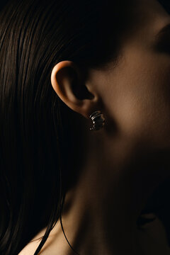 Side View Unrecognizable Woman with Minimalist Earrings 