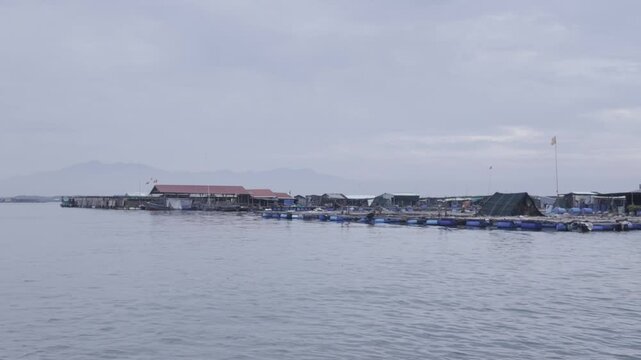 Aerial drone view of oyster farming rafts on the river in Long Son, near Ho Chi Minh City, Vietnam.