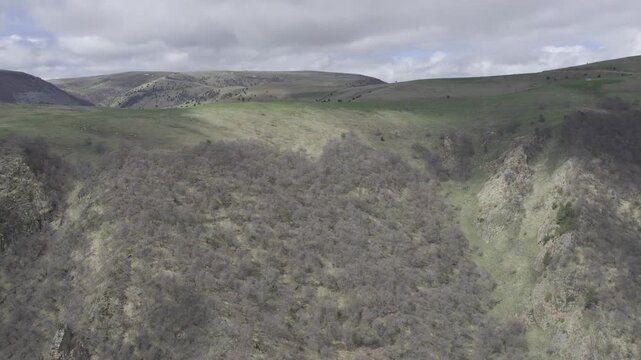 A drone video of the Caucasus Mountains, the Dzhily‑Su Valley, and the Pkhia Pass, Arkhyz, Russia, 2026.

