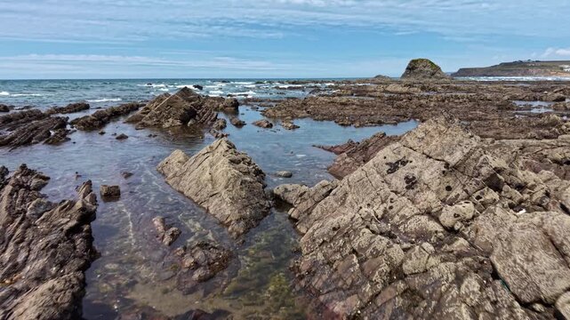Rocks of beauty on Cornwall's Widemouth Bay in summer