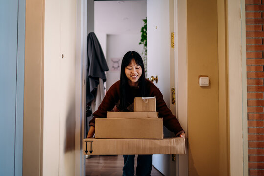 A woman with boxes in her hands