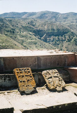 Ancient Stones on a Hillside Near Mountain Ranges in Bolivia
