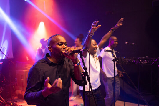 African american male singer performing live on stage