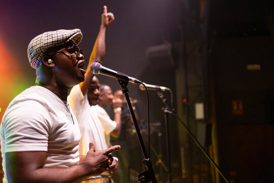 African american male singer performing live on stage