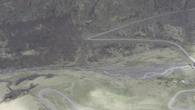 A drone video of the Caucasus Mountains, the Dzhily‑Su Valley, and the Pkhia Pass, Arkhyz, Russia, 2026.

