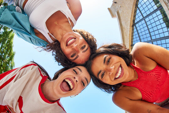 Friends smiling and having fun outside on a sunny day