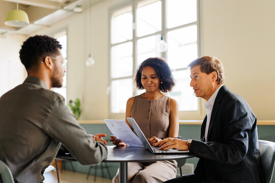 Professionals interacting at a job interview