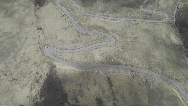 A drone video of the Caucasus Mountains, the Dzhily‑Su Valley, and the Pkhia Pass, Arkhyz, Russia, 2026.

