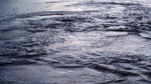 Water moves through a culvert on the Bear River in the Bear River Migratory Bird Refuge, Corrine Utah.