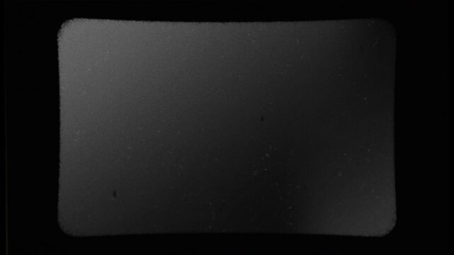 Abstract dark gray texture with subtle light gradients.