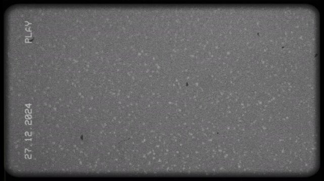 Old VHS video tape footage with static noise and date overlay.