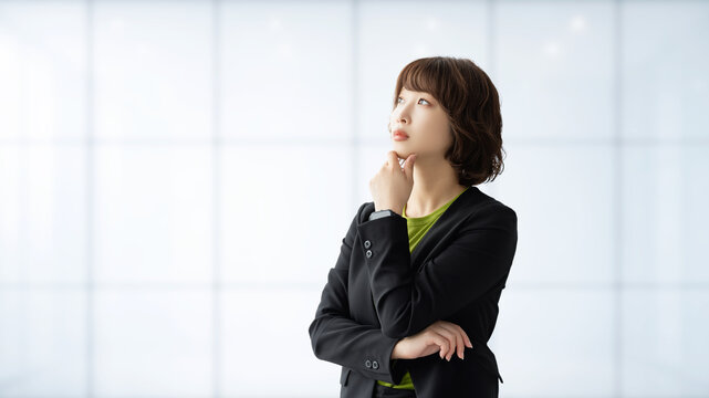 考えごとをする女性・ビジネスウーマン, Businesswoman Thinking