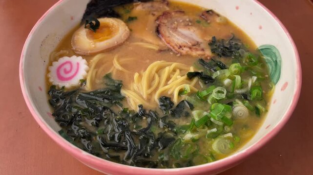Traditional Japanese ramen noodle soup served in a restaurant