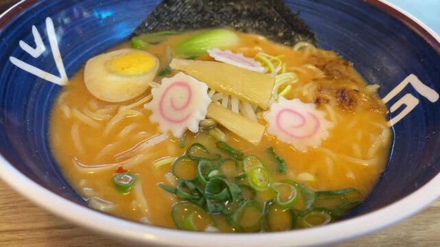 Traditional Japanese ramen noodle soup served in a restaurant