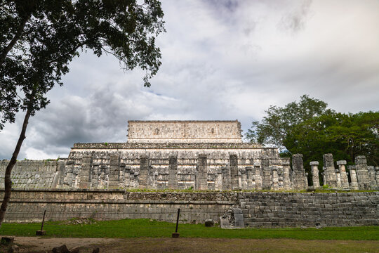 Side view of the Temple of the Warriors with stone columns at Chichen Itza, Mexico